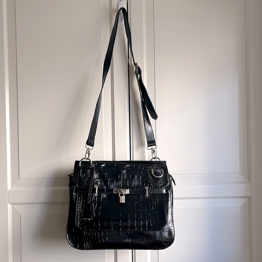 Black alligator embossed vinyl shoulder handbag.